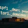 A rural hospital depiction with floating spf and dkim selectors overlayed against a twighlight sky